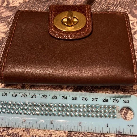 Coach wallet in supple smooth brown leather with snake pattern. - Picture 1 of 3